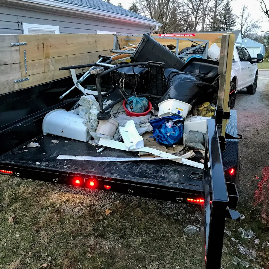 Roll-off dumpster delivered to a residential driveway in West Frankfort